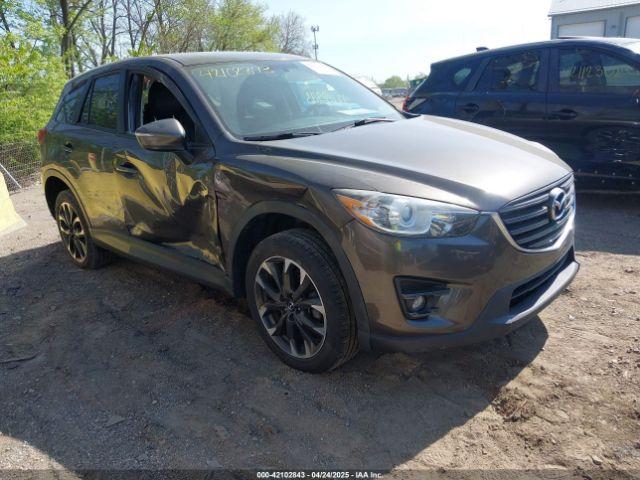  Salvage Mazda Cx